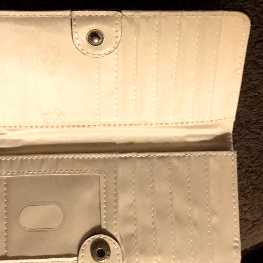 Unbranded. Very gentle preloved condition Blue and White wallet.